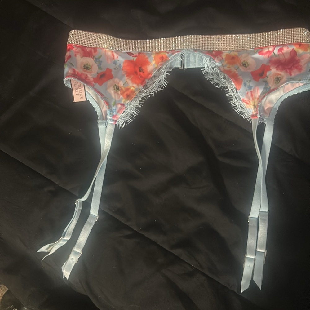 Blue floral w/ Rinestone along top Victoria Secrets XS/S Garners belt . NWT